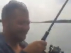 Ожесточенная борьба рыбака с гигантским судаком в Ростовской области попала на видео