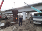 Мост на Малиновского: власти смогли изъять землю, но не справились с автовладельцами