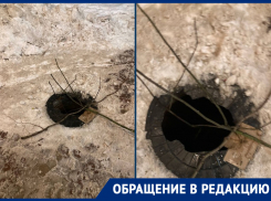 Поломанный люк с ветками в центре Ростова пугает приезжих 