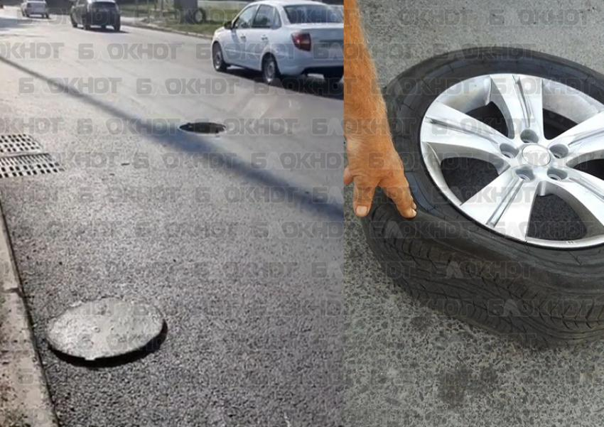 В Ростове на Каширской люк повредил автомобиль: после нового асфальта крышки остались незакрепленными